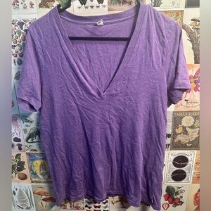 Purple TNA v neck. Slightly worn. Size medium.